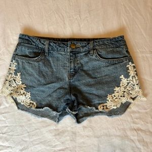 Laced and distressed Harper jean shorts